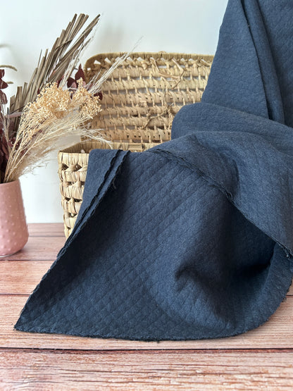 Tissu matelassé bleu chiné