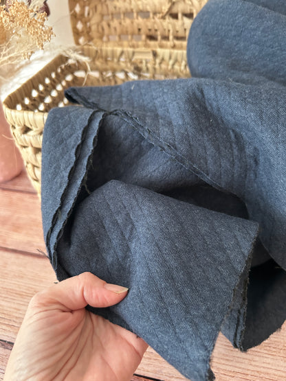 Tissu matelassé bleu chiné